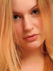 Danielle in lingerie plays with her pussy and tits