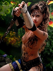 Savage brunette amazon babe with body paintings
